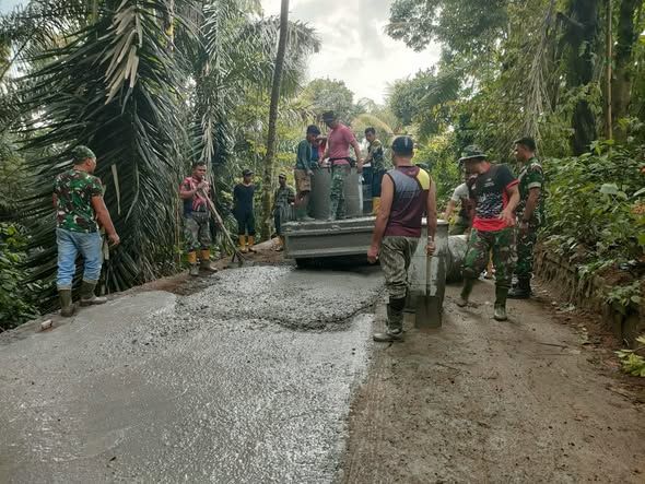 Satgas TMMD dan Warga Giri Madia Berpacu Selesaikan Pembangunan Desa.